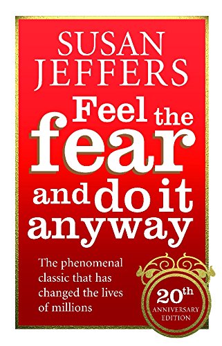 "Red book cover with white text, featuring title 'Feel the fear and do it anyway'."