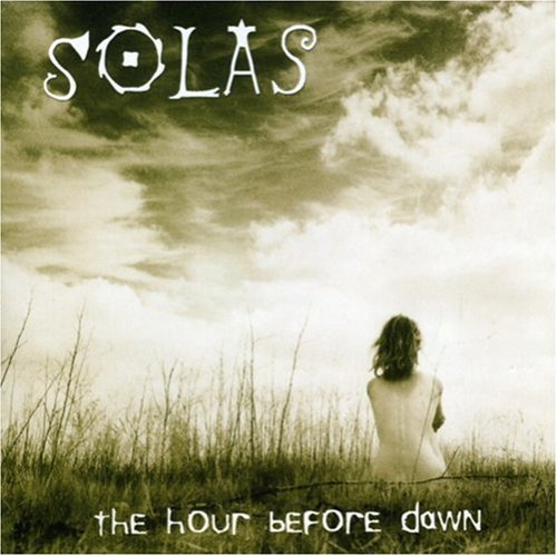 Album cover with a woman in a field, cloudy sky, and text "SOLAS the hour before dawn".