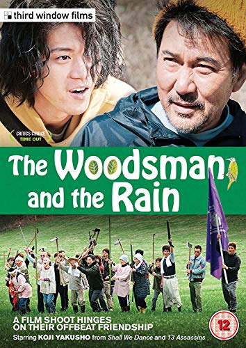 DVD cover for "The Woodsman and the Rain" with two men and a group scene.