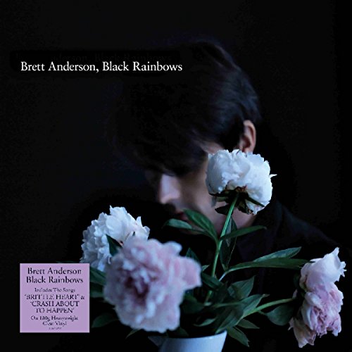 "Brett Anderson's 'Black Rainbows' vinyl album cover featuring a man with flowers."