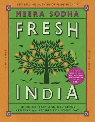 "Book cover with green background, tree illustration and title 'Fresh India' in large white letters."