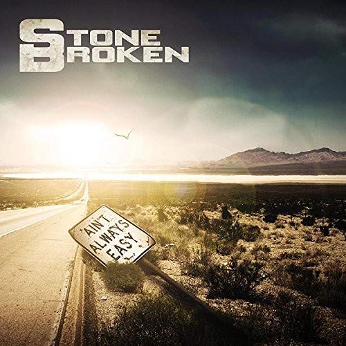 "Album cover with a desert road and a tilted 'Ain't Always Easy' sign."