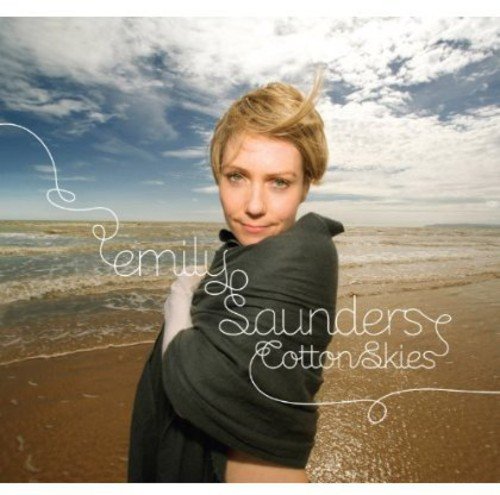 "Album cover featuring a woman on a beach with text overlay."