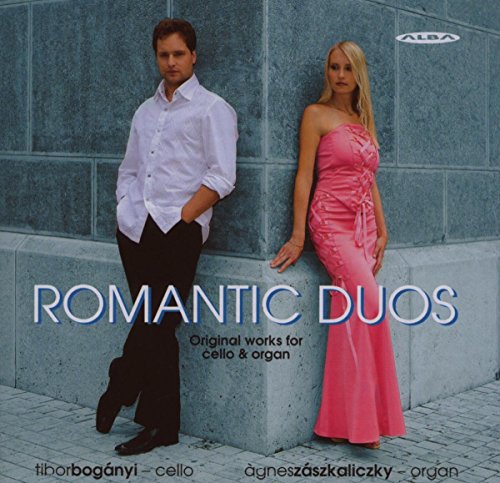 CD cover featuring a man and woman standing against a grey stone wall.