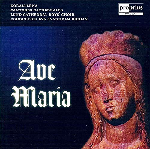 CD cover with a wooden statue of the Virgin Mary against a dark blue background.