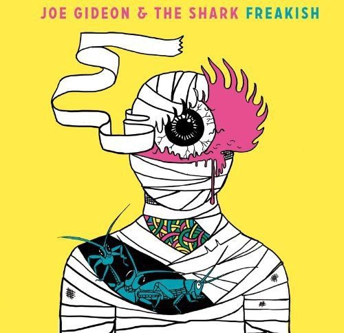 Album cover featuring a mummy-like figure with a large eye and insects on a yellow background.