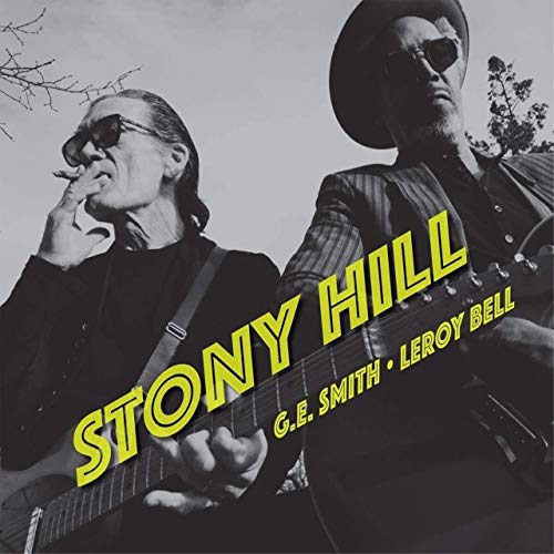 "CD cover with two men holding guitars, title 'Stony Hill' in yellow font."