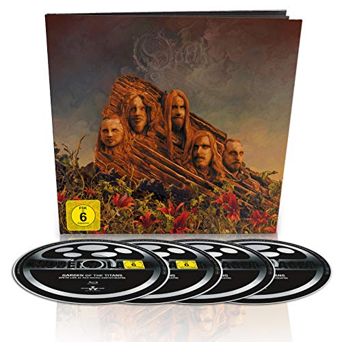 "CD case with artwork and four discs, featuring the band Opeth's faces in a wooden structure."