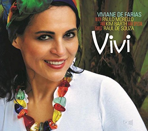 "CD cover featuring a smiling woman with colorful headscarf and necklace."