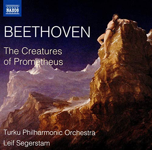 A classical music CD cover featuring a man on a rocky cliff.
