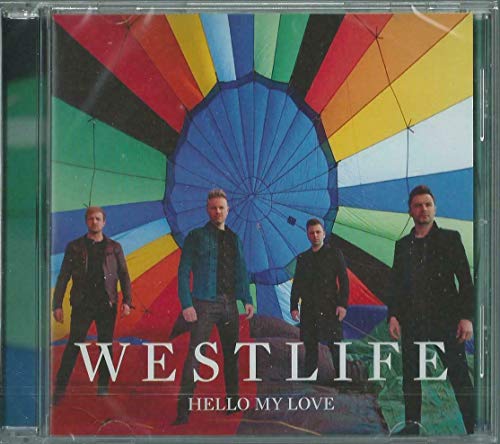 "CD case with Westlife band members standing in front of a colorful parachute."