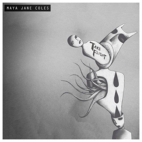 "Black and white vinyl album cover with a playing card illustration and artist's name."