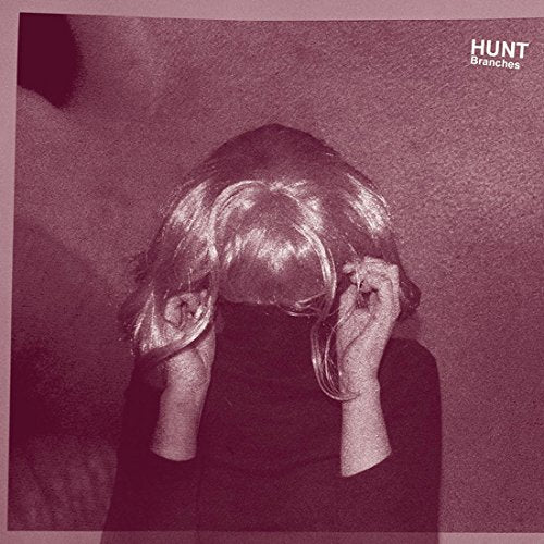A person with long blonde hair covering their face, album cover with "Hunt Branches" text.