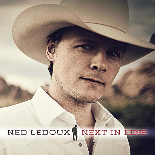 "Album cover featuring Ned Ledoux in a cowboy hat and white shirt."