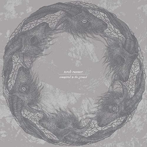 A vinyl album cover featuring a circular, dragon-like illustration in shades of gray.