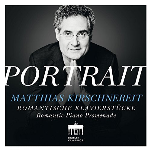 CD cover with black and white photo of man and white and blue text.
