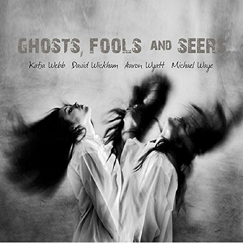 "Black and white album cover with blurred, multiple images of a woman."