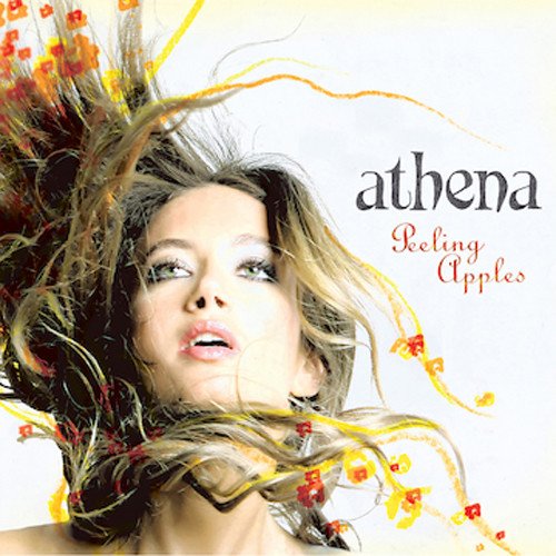 "Album cover with a woman surrounded by flowing hair and autumn leaves."