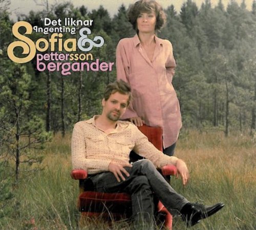 "Album cover featuring a man and woman in a forest, with text overlay."