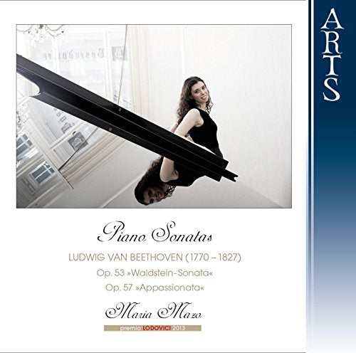 CD cover featuring a woman in black sitting on a grand piano.