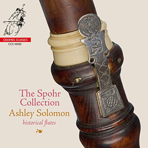 CD cover featuring a close-up of an ornate, dark wooden flute on beige background.