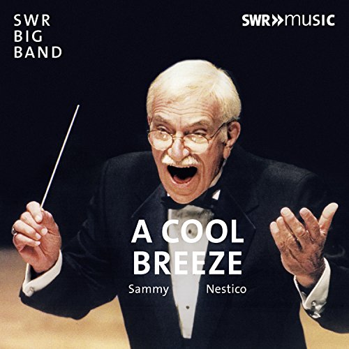 CD cover with older man in tuxedo holding a conductor's baton.
