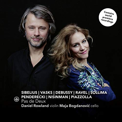 CD cover featuring a man and woman against a black background, with white text.