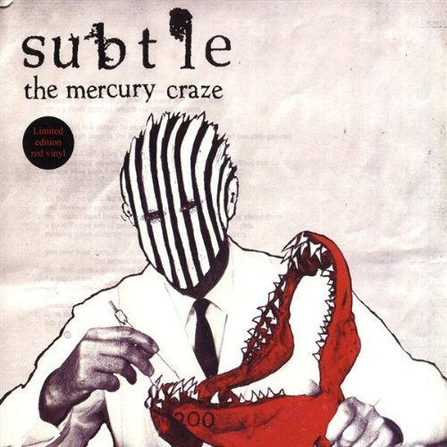 Vinyl album cover with a man holding a red alligator, face striped black and white.