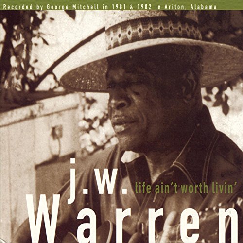 "Sepia-toned album cover featuring a man in a straw hat, with text overlay."