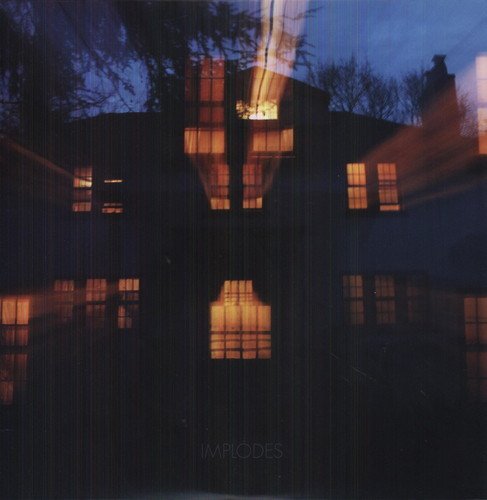 Darkened house with lit windows, blurry effect, and "IMPLODES" text at the bottom.