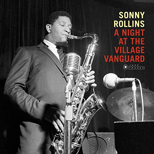 "Album cover with man playing saxophone, black background, and title text."