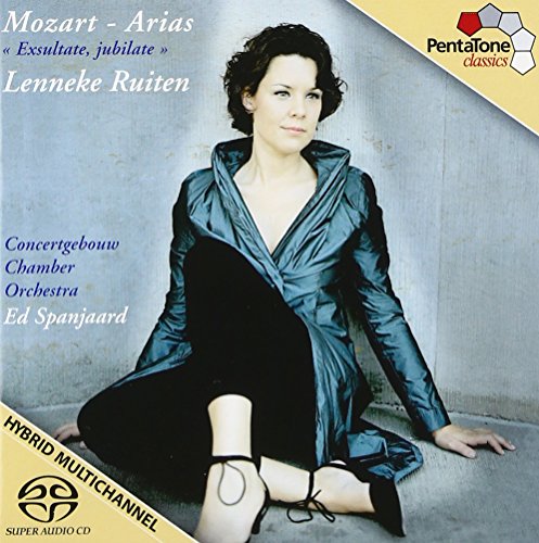 CD cover featuring a woman in a green dress sitting on the floor.
