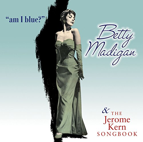 CD album cover featuring a woman in a long, green evening gown.