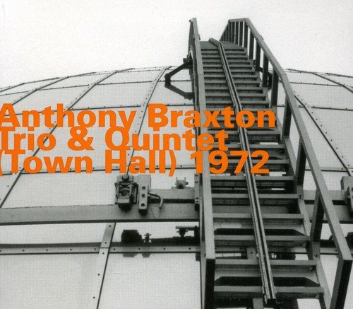 "CD cover featuring a metal staircase and orange text."