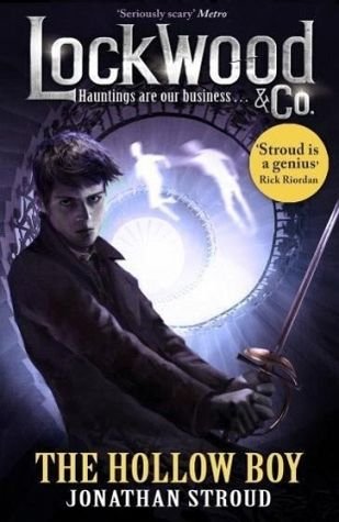 Book cover featuring a young man holding a sword, with a glowing portal behind him.