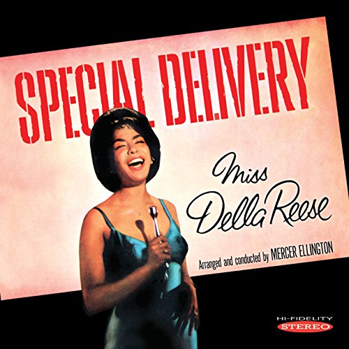 "Della Reese album cover featuring a smiling woman holding a microphone, wearing a blue dress."
