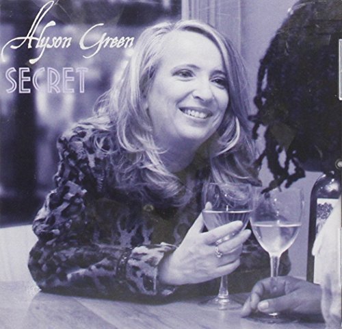 Alyson Green's album cover: a smiling woman holding a wine glass.