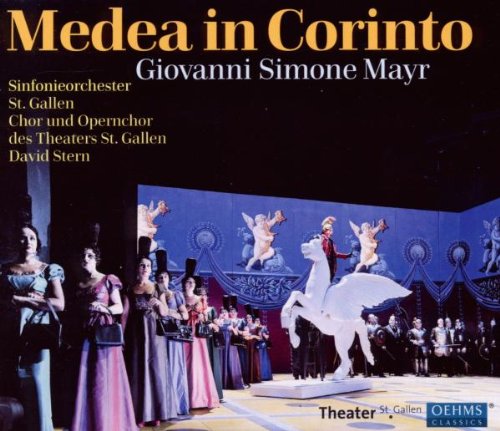 "CD cover for 'Medea in Corinto' featuring a stage scene with actors and a white horse."