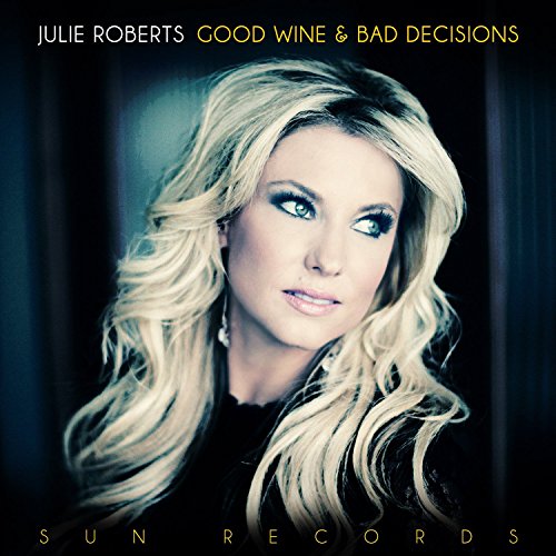 Album cover featuring a blonde woman with dark roots against a dark background.