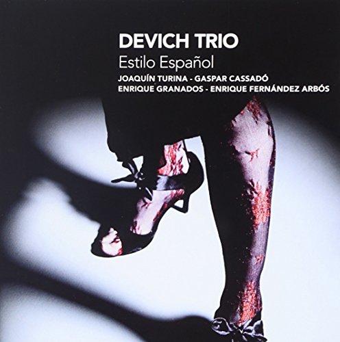 CD case cover with a woman's legs and heels, torn stockings, and white text.