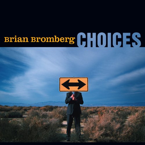 Album cover with a man in a suit holding a sign over his head.