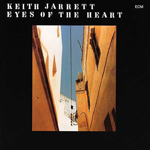 "Album cover with 'Keith Jarrett - Eyes of the Heart' title, featuring a narrow alleyway photo."