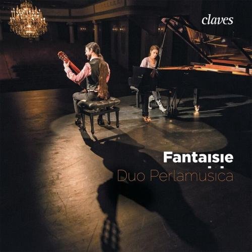 "CD cover featuring a guitarist and pianist performing on a dimly lit stage."