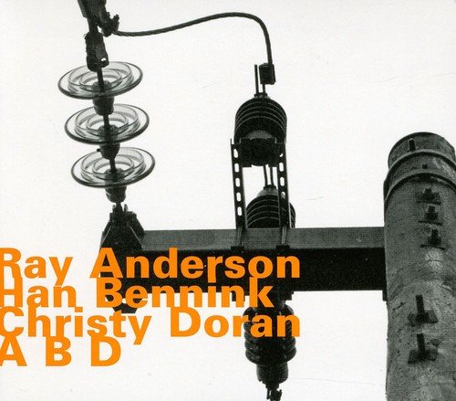 "CD cover with black-and-white electrical pole image and orange text listing artist names."