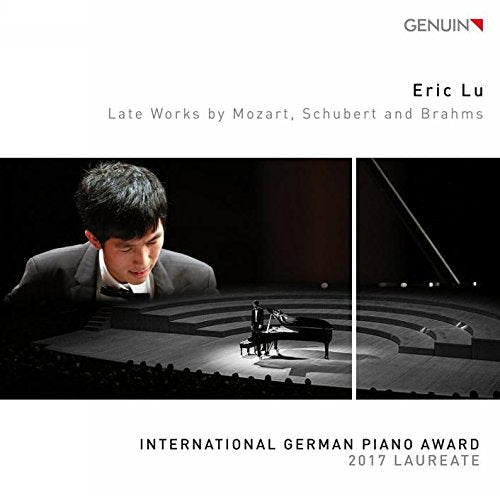 "CD cover featuring a pianist playing on stage, with award information and artist name."