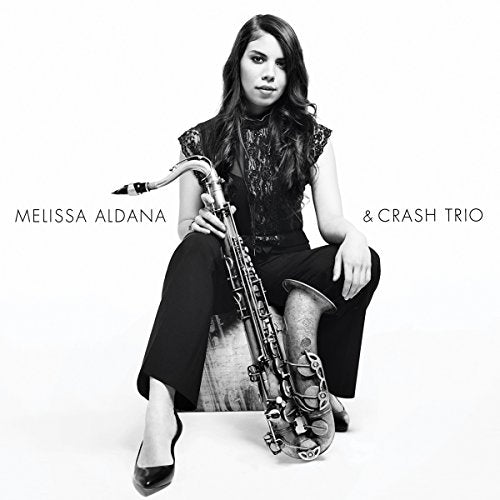 Black and white album cover with a woman holding a saxophone.