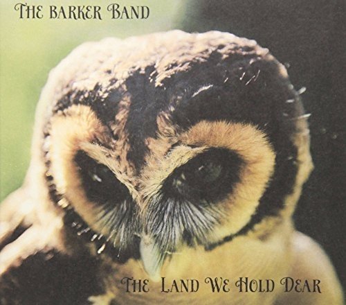 Album cover featuring a close-up of an owl's face with text "The Barker Band" above.