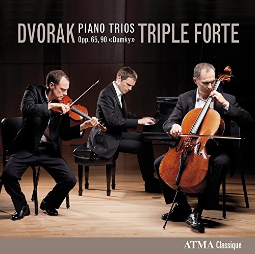 CD cover featuring three musicians playing violin, piano, and cello on a stage.