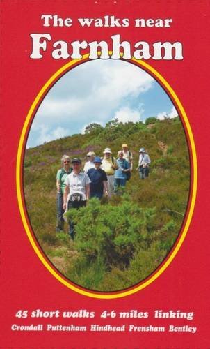 Red book cover with title "The walks near Farnham" and group walking in a field.
