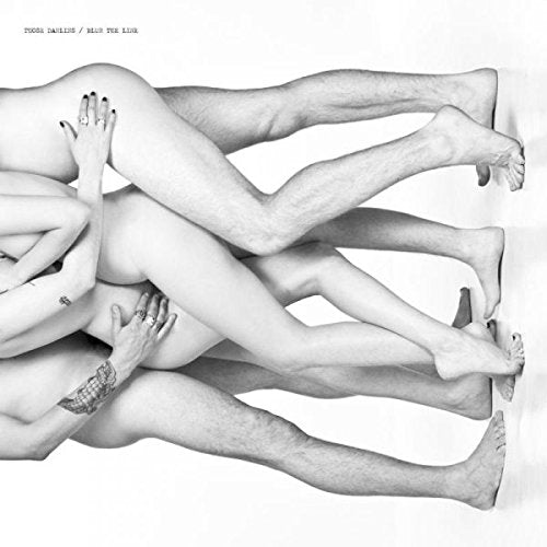 Black and white album cover with intertwined male and female nude figures.